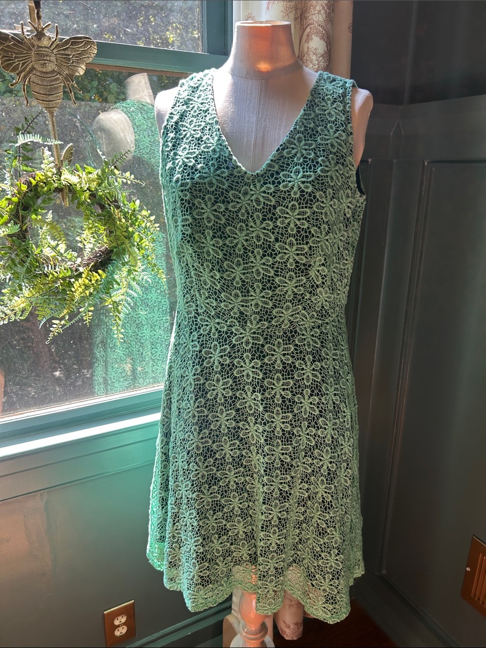 Cynthia Rowley Sleeveless V-Neck Mint Lace Dress with navy under lace